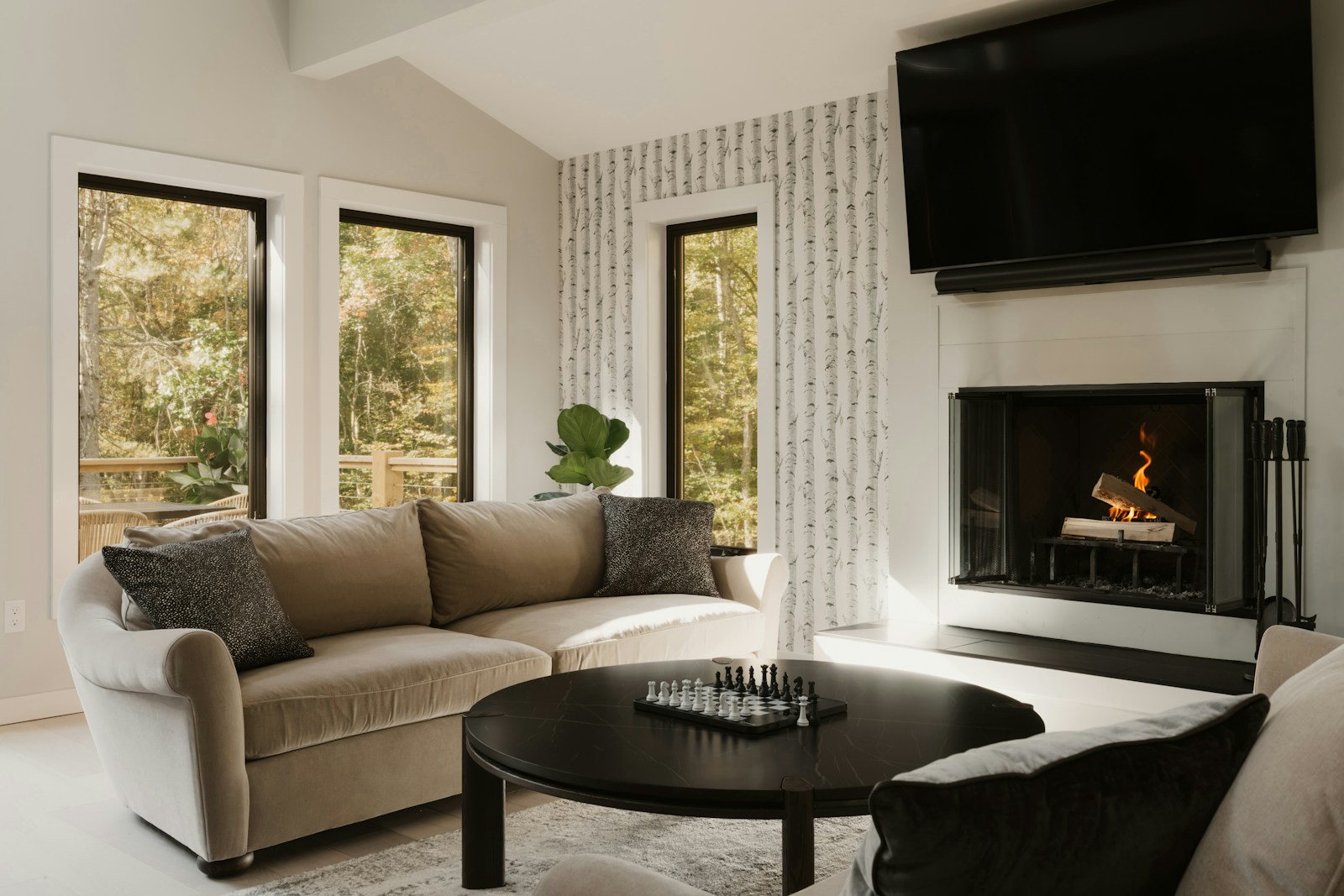 Illustrative reference photograph of a beige three-seat sofa in a living room; not NicLogistics inventory.